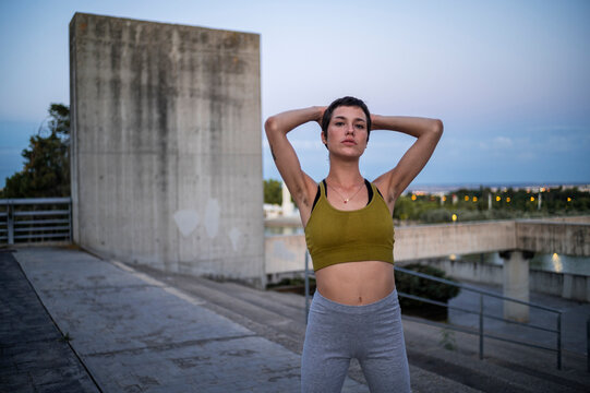 Sporty woman with hairy armpits, body hair