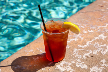 Iced Tea in Plastic Cup Poolside