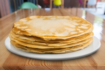 Stack of pancakes on a plate. Homemade pancakes, delicious food. Traditional dish