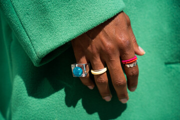 Male hand with colored rings
