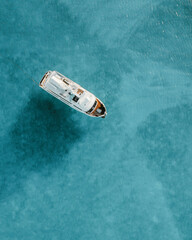 Aerial photo of yacht anchored in Conception Island Bahamas