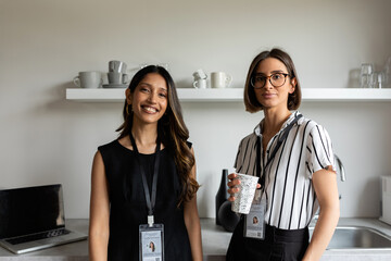 Female coworkers in office kitchen