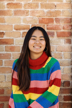 Asian Woman Smiling At City Potrait