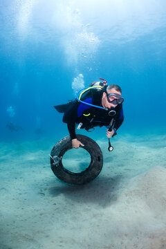 Man Cleaning Up the Ocean