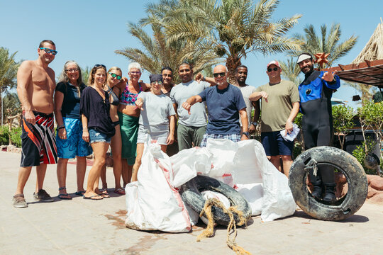 Big Group of Diverse People Volunteering at Trash Cleanup