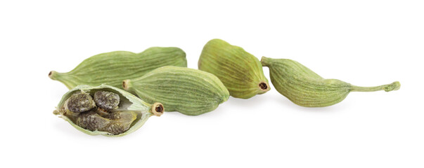Pile of dry green cardamom pods isolated on white