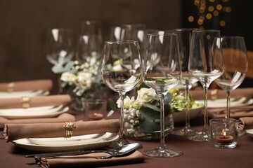 Stylish elegant table setting for festive dinner in restaurant