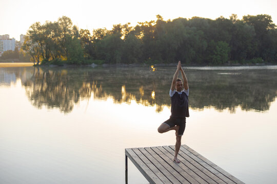 Man Doing Vrikshasana Asana