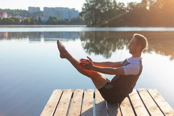 man practicing sitting balance