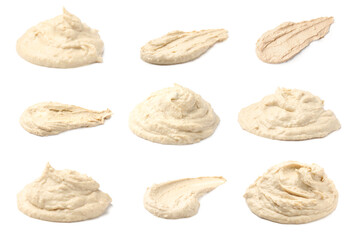 Set with tasty hummus on white background