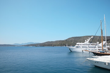 Fototapeta premium Beautiful view of different boats in sea near shore on sunny day