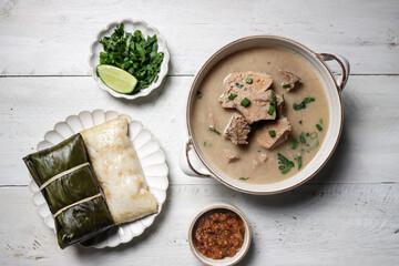 Coto Makasar is Indonesian traditional food from Makasar, Sulawesi, served with Buras.