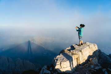 Woman filming with an action camera