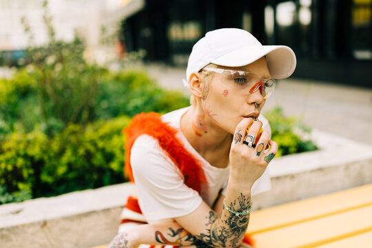 Young woman with white hat outdoor