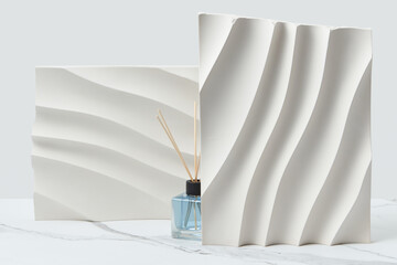 Aroma diffuser with white ribbed panels.