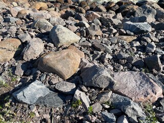 Pile of stones lies on the beach