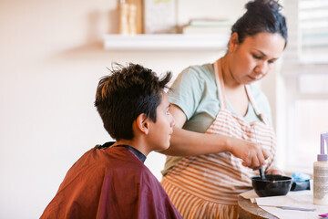 Mom dyeing her preteen son at home