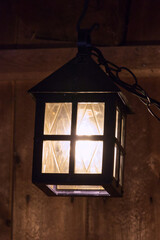 Old Lantern in a Wooden House
