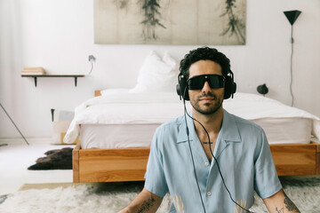 Young Man Using Brain Machine to Alter Brain Wave Function