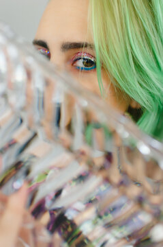Strange portrait of a bisexual bright woman 
