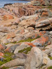 Fototapeta na wymiar Rocks and large boulders on coastal edge