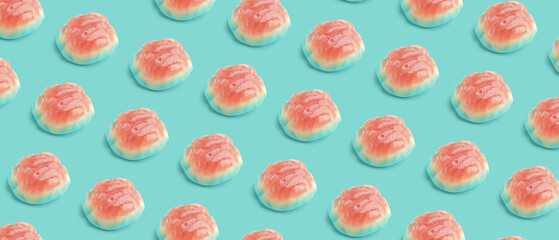 Tasty scary candies for Halloween on blue background