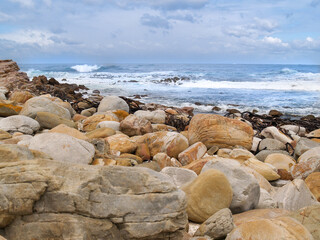 Fototapeta na wymiar Rocky foreshore and rough seas at Cape Of Good Hope
