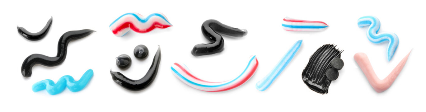Samples of different tooth paste on white background