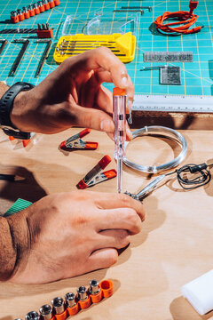 Technician working on wires and cables.