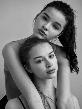 Portrait of young beautiful model sisters