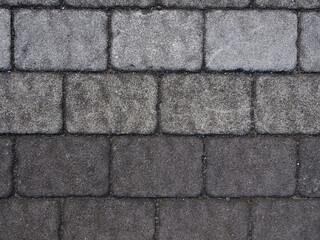 横長で灰色のグラデーションの角丸長方形のレンガのテクスチャー