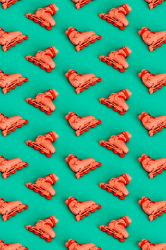 vertical pattern of  pink rollerblades