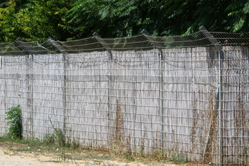 Fence in a city park on the shores of the Mediterranean Sea.