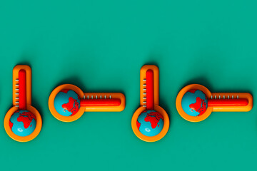 top down view of thermometers with a earth planet