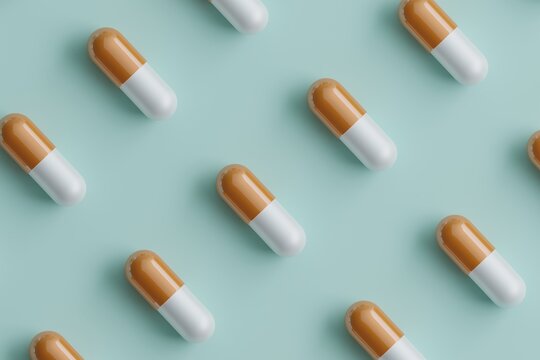 White and orange pills arranged in rows on a blue background.