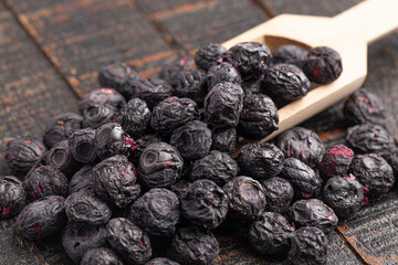 Freeze Dried Blueberries Isolated on a Dark Wooden Table