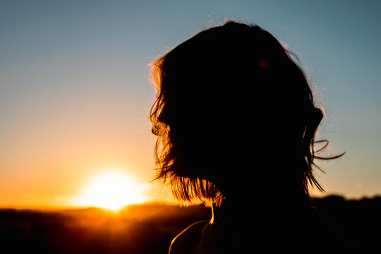 Female watching the sunset