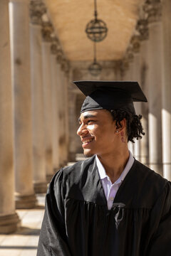 Portrait of African American college graduate with mortarboard 