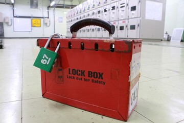 Lock box and switch gear room background ,Lockout Tagout , Electrical safety system.Key lock switch or circuit breaker for safety protect.in electric room	 - 522166805