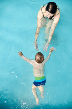 mother and child in the pool