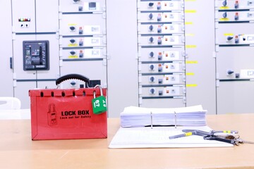 Lock box and switch gear room background ,Lockout Tagout , Electrical safety system.Key lock switch or circuit breaker for safety protect.in electric room - 522168062