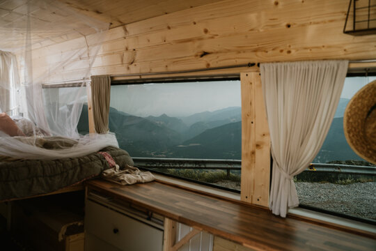 Camper van indoors with bed 