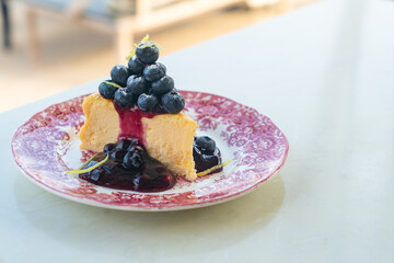 blueberry cheese cake on plate