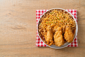 Korean instant noodles with fried chicken or Fried chicken ramyeon