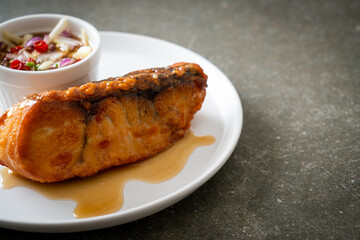fried snapper fish with fish sauce and spicy salad