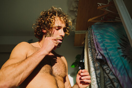 Man preparing a cigarette of weed