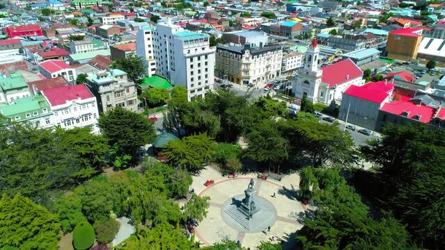 Aerial Tilt Down Shot Of Monumento Hernando De Magallanes Monument In City - Punta Arenas, Chile