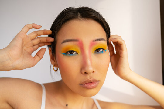 Female model with creative colorful makeup