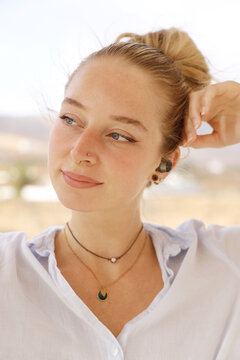 Young Woman With Earplugs