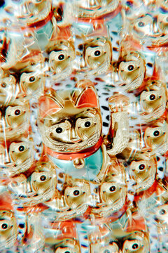 a chinese lucky cat in a kaleidoscopic image